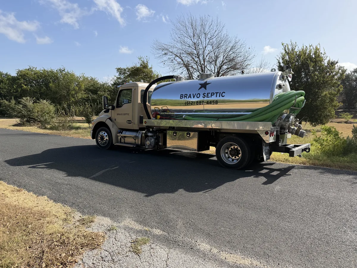 The Bravo Septic pump truck arriving on a rural road for a service call in Central Texas